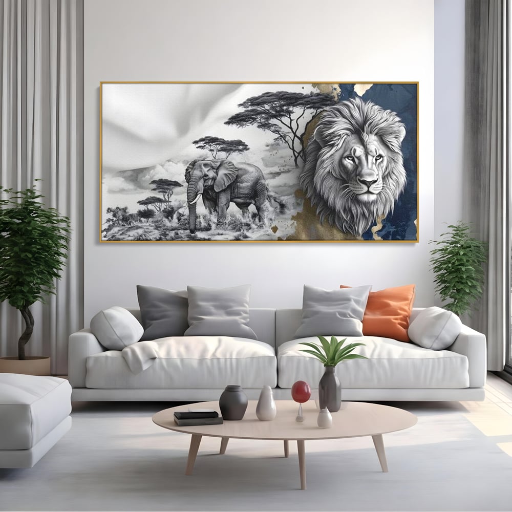 Tablou canvas cu tablou canvas cu leu si elefant, in rama de aluminiu auriu, pe perete intr-un living